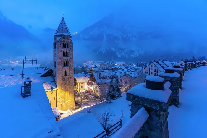 Framed Print : Church of Saint Pantalon and snow covered town centre and mountainous background in winter at dusk, Courmayeur, Aosta Valley, Italian Alps, Italy Framed Print : Church of Saint Pantalon and snow covered town centre and mountainous background in winter at dusk, Courmayeur, Aosta Valley, Italian Alps, Italy