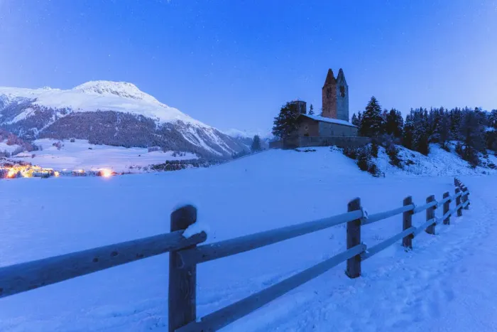 Framed Print : Church of San Gian with the snowy peaks in background, Celerina, St Framed Print : Church of San Gian with the snowy peaks in background, Celerina, St