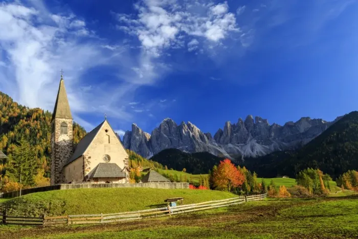 Framed Print : Church of St. Magdalena immersed in the colors of autumn, with the Odle Mountains in the background Framed Print : Church of St. Magdalena immersed in the colors of autumn, with the Odle Mountains in the background