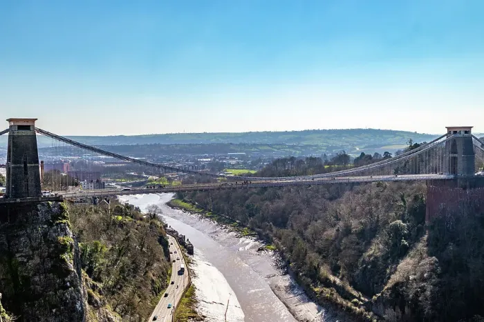 Framed Print : Cifton Suspension Bridge over a scenic gorge with a river, under a clear blue sky in Bristol, England, United Kingdom, Europe Framed Print : Cifton Suspension Bridge over a scenic gorge with a river, under a clear blue sky in Bristol, England, United Kingdom, Europe