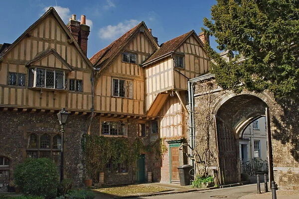 A city gate with timbered infilled gabled building, Winchester, Hampshire