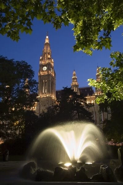 City hall at dusk with fountain in foreground, Vienna, Austria, Europe