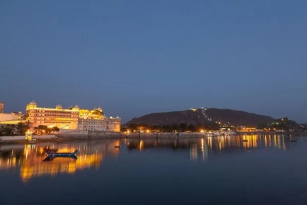 City Palace in Udaipur at night, reflected in Lake Pichola, Udaipur, Rajasthan, India
