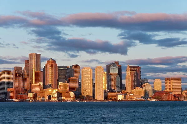 City skline viewed across Boston harbour at dawn, Boston, Massachusetts