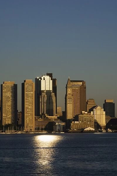 City skyline across Boston Harbor at dawn
