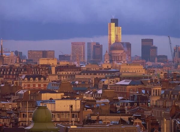 City skyline, including St. Pauls Cathedral and the NatWest Tower at dusk