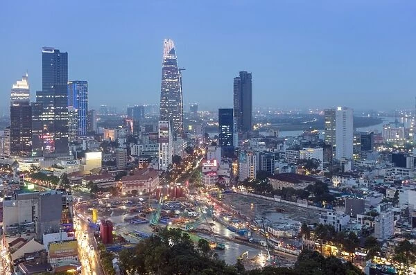 City skyline at night showing the Bitexco tower, Ho Chi Minh City (Saigon), Vietnam