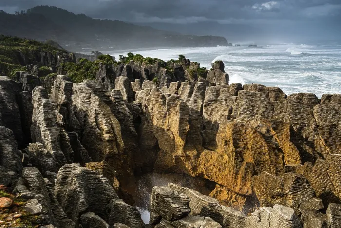 Framed Print : Classic Layered Limestone Formations of Pancake Rocks Framed by Dramatic Coastline, Punakaiki, West Coast, New Zealand Framed Print : Classic Layered Limestone Formations of Pancake Rocks Framed by Dramatic Coastline, Punakaiki, West Coast, New Zealand