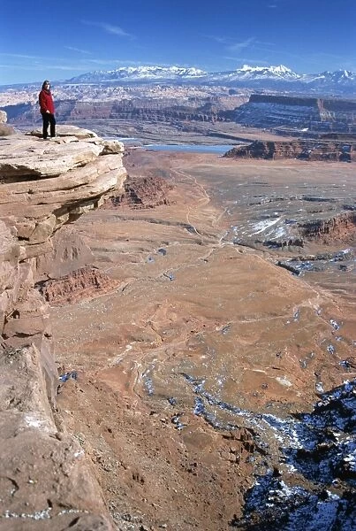 Cliff edge 300m above red desert basin