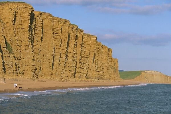 Cliffs towering over West Bay Beach, Dorset, England, United Kingdom, Europe
