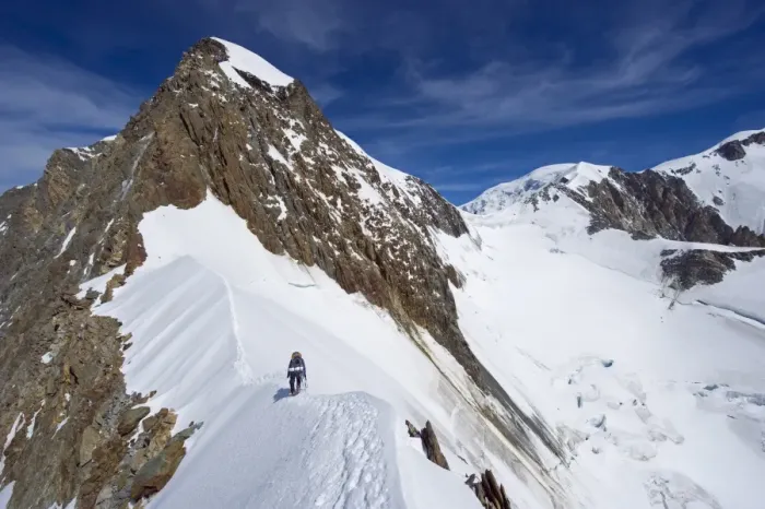 Framed Print : Climber on snow ridge, Aiguille de Bionnassay on the route to Mont Blanc Framed Print : Climber on snow ridge, Aiguille de Bionnassay on the route to Mont Blanc