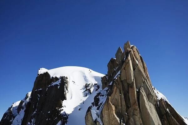 Climbers on Midi Plan traverse, Chamonix, Haute Savoie, Rhone Alpes, French Alps
