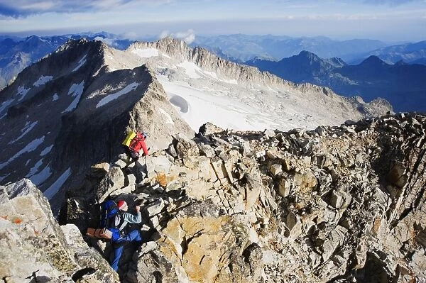 Climbers on summit of Pico de Aneto, at 3404m the highest peak in the Pyrenees