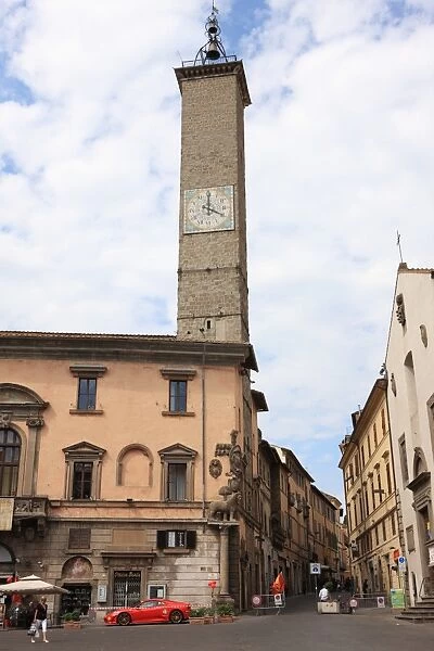 Clock with Roman numerals on 13th century brick tower, Palazzo del Podesta, Viterbo, Lazio, Italy, Europe