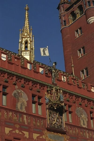 Clock, wall paintings and bell tower on the Town Hall in Basle