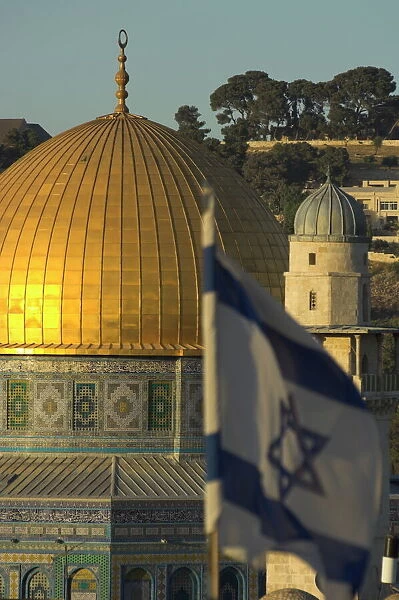 Close up of Dome of the Rock with Israeli flag in foreground