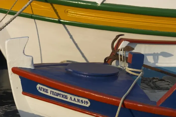 Framed Print : Close up of two freshly painted fishing boats Framed Print : Close up of two freshly painted fishing boats