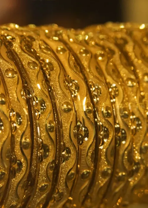 Framed Print : Close up of gold bangles on display Framed Print : Close up of gold bangles on display