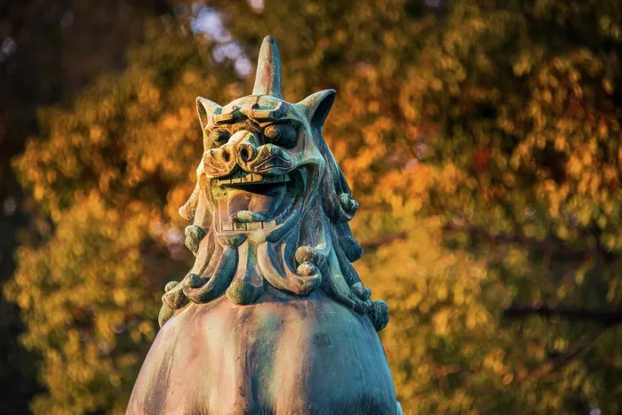 Framed Print : Close up of a japanese Lions statue against blurred autumn foliage, Hiroshima, Japan Framed Print : Close up of a japanese Lions statue against blurred autumn foliage, Hiroshima, Japan