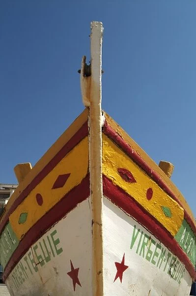 Close up of the prow of a traditional painted fishing boat