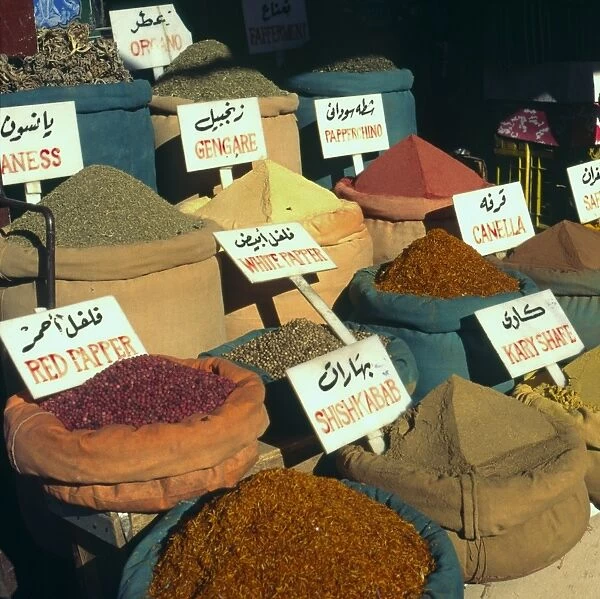 Close up of pyramids of loose spices for sale in local market, Aswan, Egypt