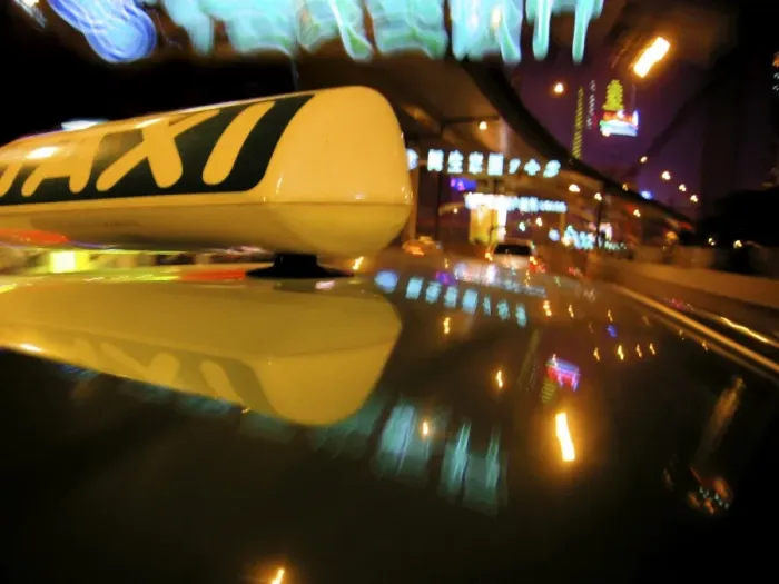 Framed Print : Close up of Taxi sign on car roof with neon road signs, Shanghai, China, Asia Framed Print : Close up of Taxi sign on car roof with neon road signs, Shanghai, China, Asia