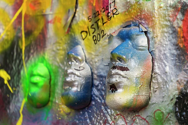 Close-up of artwork faces at John Lennon Wall, Prague, Bohemia, Czech Republic (Czechia), Europe
