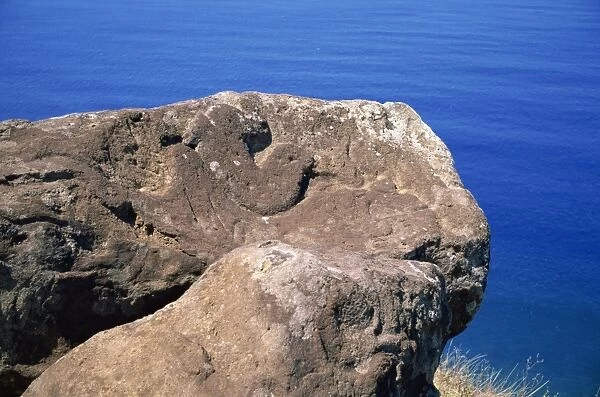 Close-up of the Bird Man petroglyph at Orongo ceremonial village on crater rim of Rano Kau on Easter Island (Rapa Nui), Chile, Pacific