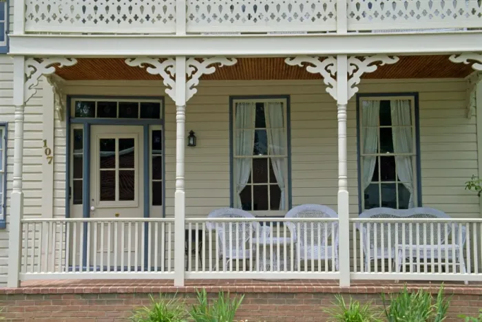 Framed Print : Close-up of brick and wood verandah of a building in St Framed Print : Close-up of brick and wood verandah of a building in St