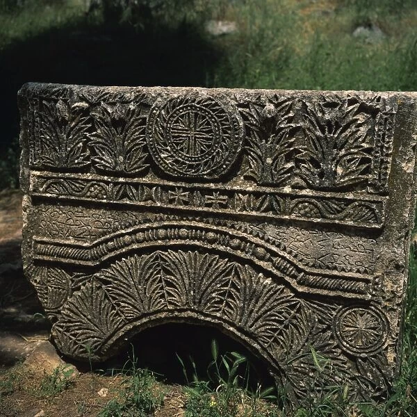 Close-up of Christian carvings on architectural remains