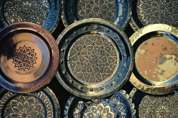 Close-up of copper trays for sale