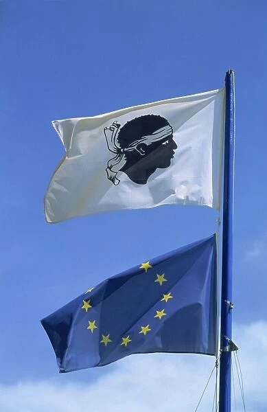 Close-up of the Corsican and European Union (EU) flags flying, Ajaccio