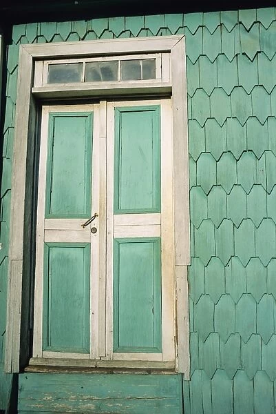 Close-up of door and house shingles (tejuelas), in zone of Dalcahue near Castro on the island of Chiloe, Chile