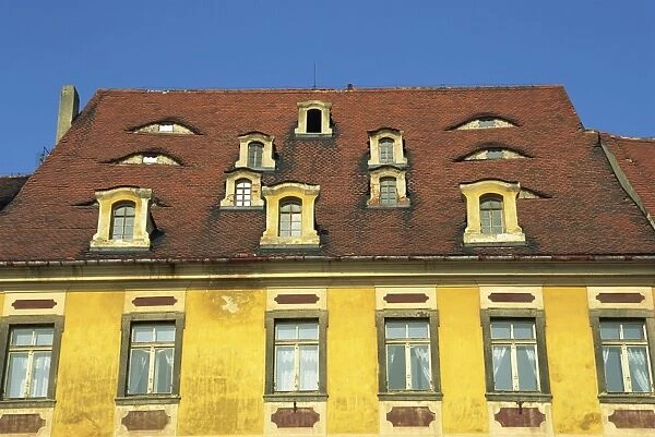 Close-up of dormer windows in the roof of a building in the market square of the medieval town of Cheb in Bohemia, Czech