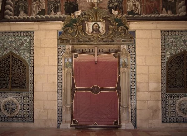 Close-up of entrance door covered with a blanket at the Armenian Church of St