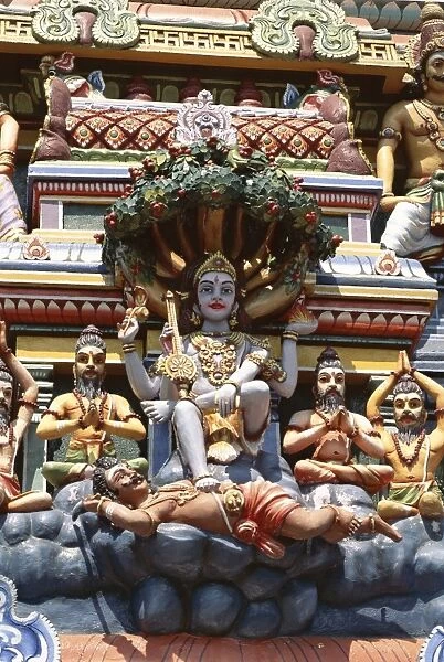 Close-up of exterior of ornate Hindu Temple