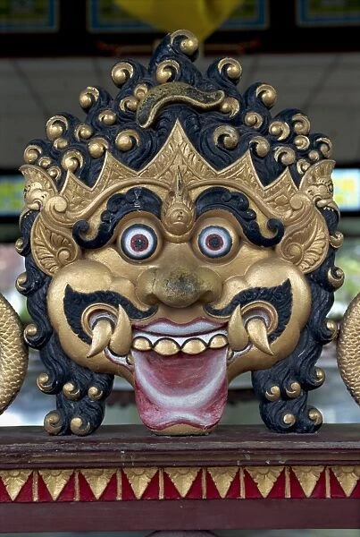 Close-up of the face of a demon at the Kraton or Sultans