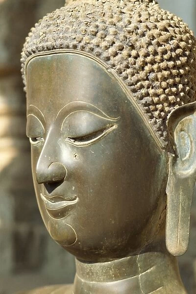 Close-up of the head of the Buddha in the Hophrakeo