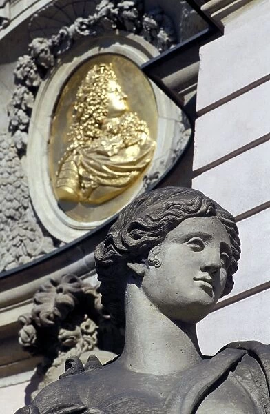 Close-up of the head of a female statue and frieze behind at Zeughaus