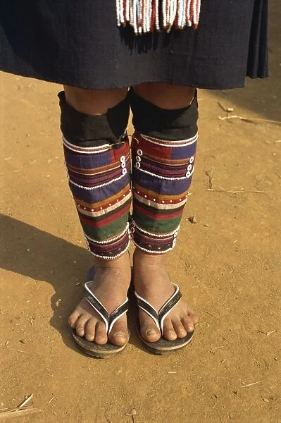 Close-up of legs and feet of a person of the Akha hill