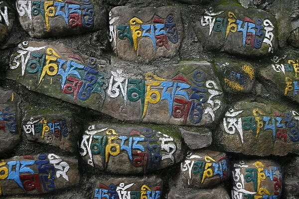 Close-up of Mani stones, Swayambhunath temple, Kathmandu, Nepal, Asia