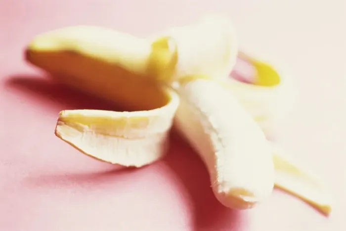 Framed Print : Close-up of a partly peeled banana Framed Print : Close-up of a partly peeled banana