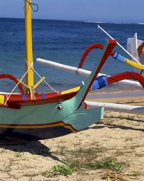 Close-up of the prow of an outrigger fishing boat on Sanur beach