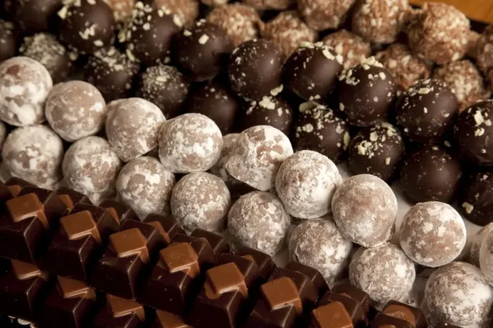 Framed Print : Close-up of rows of chocolates in a French cafe, France, Europe Framed Print : Close-up of rows of chocolates in a French cafe, France, Europe