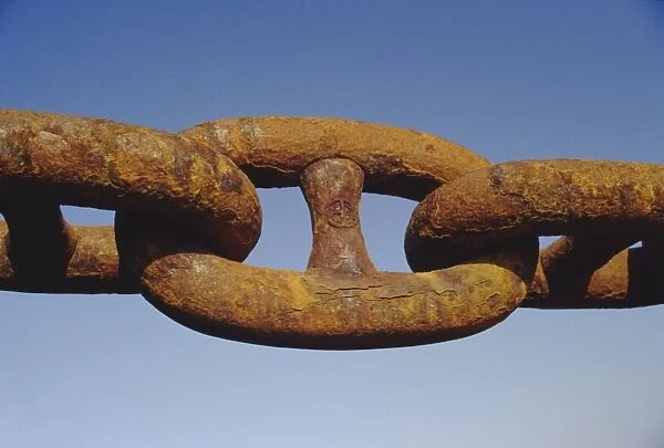 Close-up of a rusty anchor chain of a container