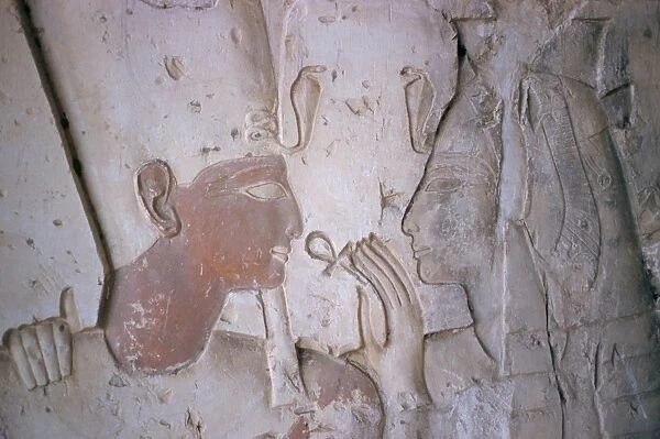 Close-up showing the ankh, symbol of life, being offered to Sethos I, pharaoh of the 19th dynasty