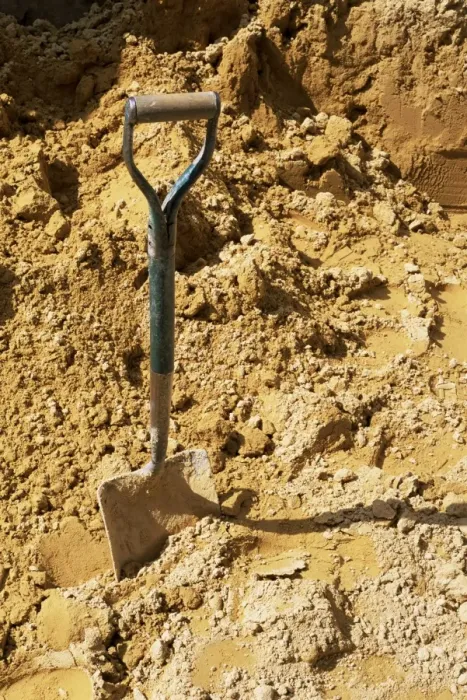 Framed Print : Close-up of spade in sand on a building site, City of London, England, United Kingdom Framed Print : Close-up of spade in sand on a building site, City of London, England, United Kingdom