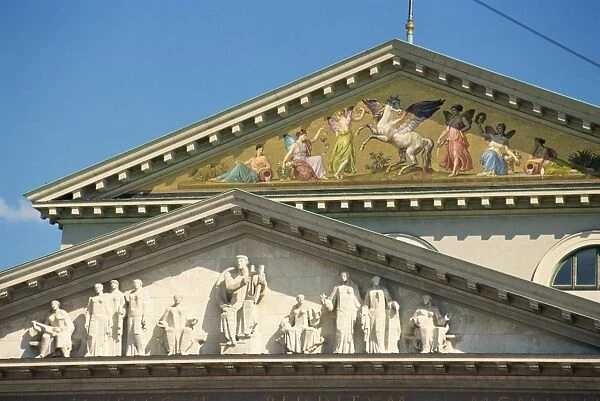 Close-up of statues and decoration on the facade of