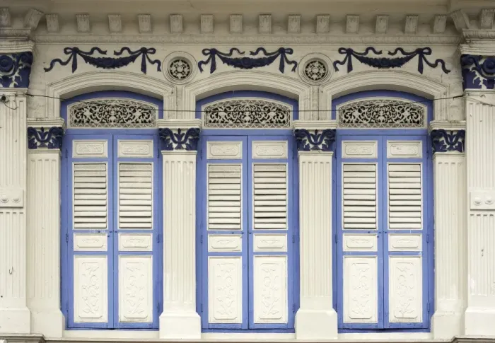 Framed Print : Close-up of traditional old houses with shuttered windows and decorative mouldings in Little India Framed Print : Close-up of traditional old houses with shuttered windows and decorative mouldings in Little India