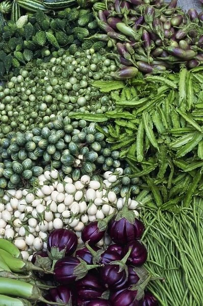 Close-up of vegetables of the aubergine family for sale in Thailand